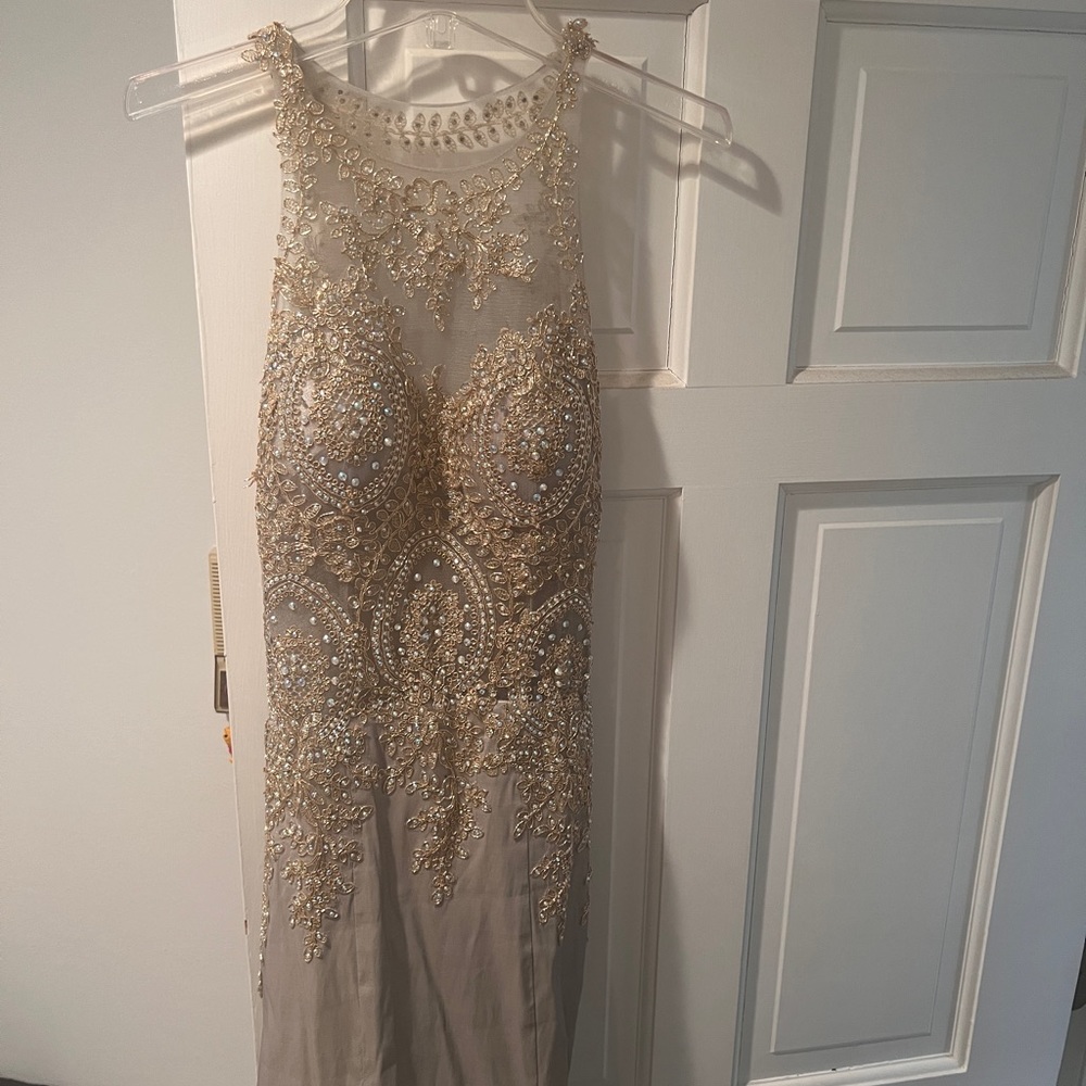 PROM SEASON! Prom dress for sale. Comes in bag for protection.